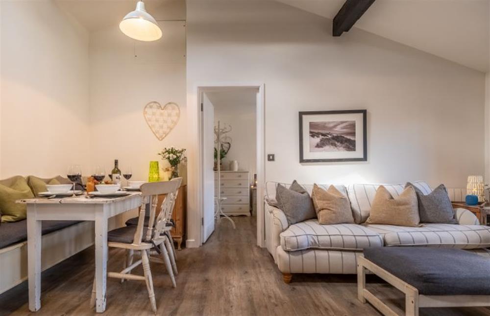 The dining and living areas at Duffields Cottage, Brancaster near Kings Lynn