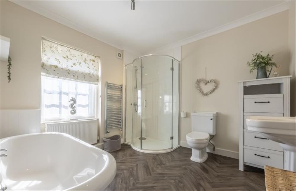 With roll-top bath and shower cubicle at Duffields House, Brancaster near Kings Lynn