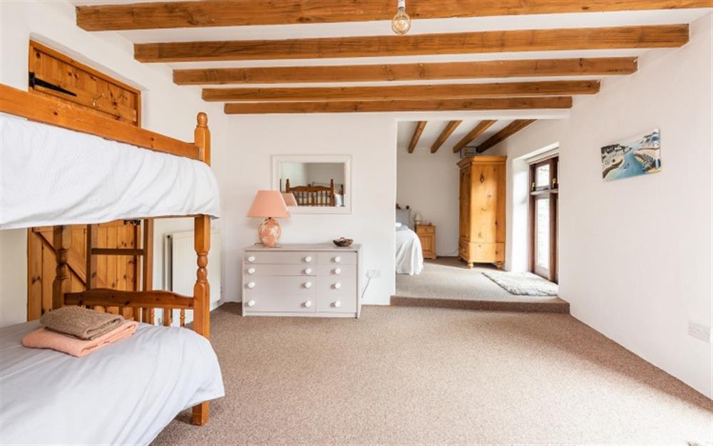 The ground floor family bedroom at Duncombe Barn in Sherford