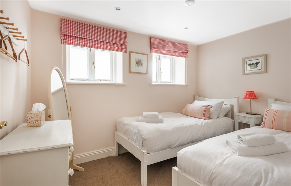 A bedroom in Dunedin Cottage (photo 2) at Dunedin Cottage in Dittisham