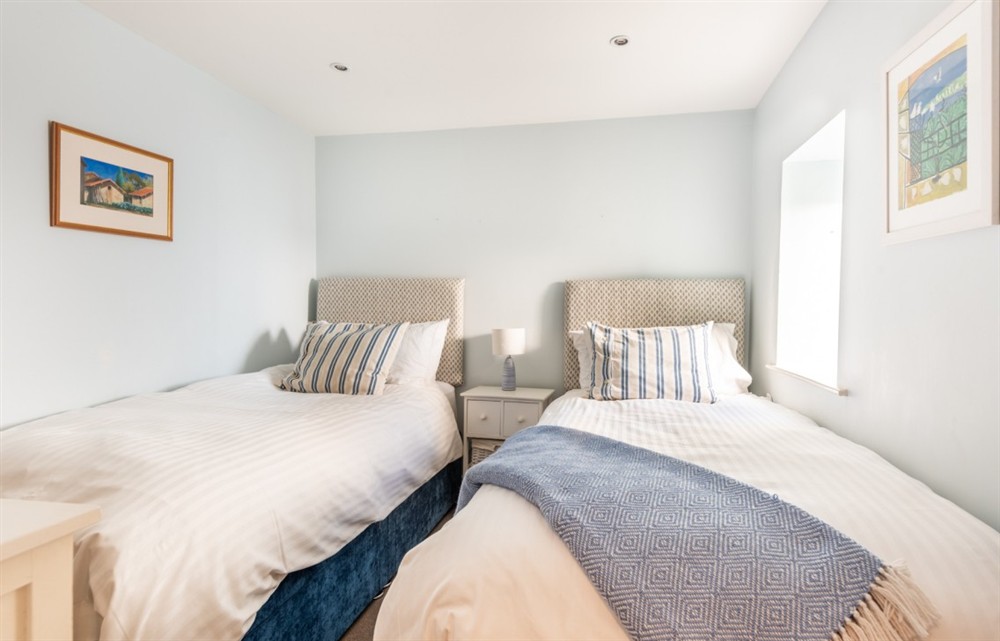 A bedroom in Dunedin Cottage at Dunedin Cottage in Dittisham
