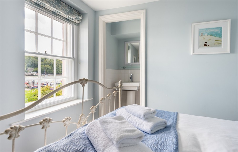 Bedroom at Dunedin Cottage in Dittisham