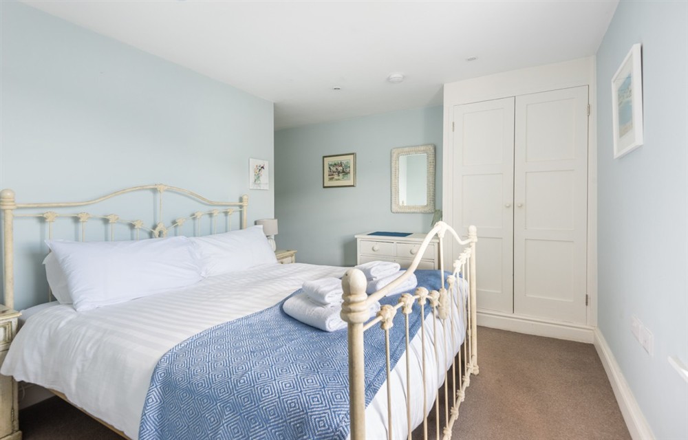 One of the bedrooms at Dunedin Cottage in Dittisham