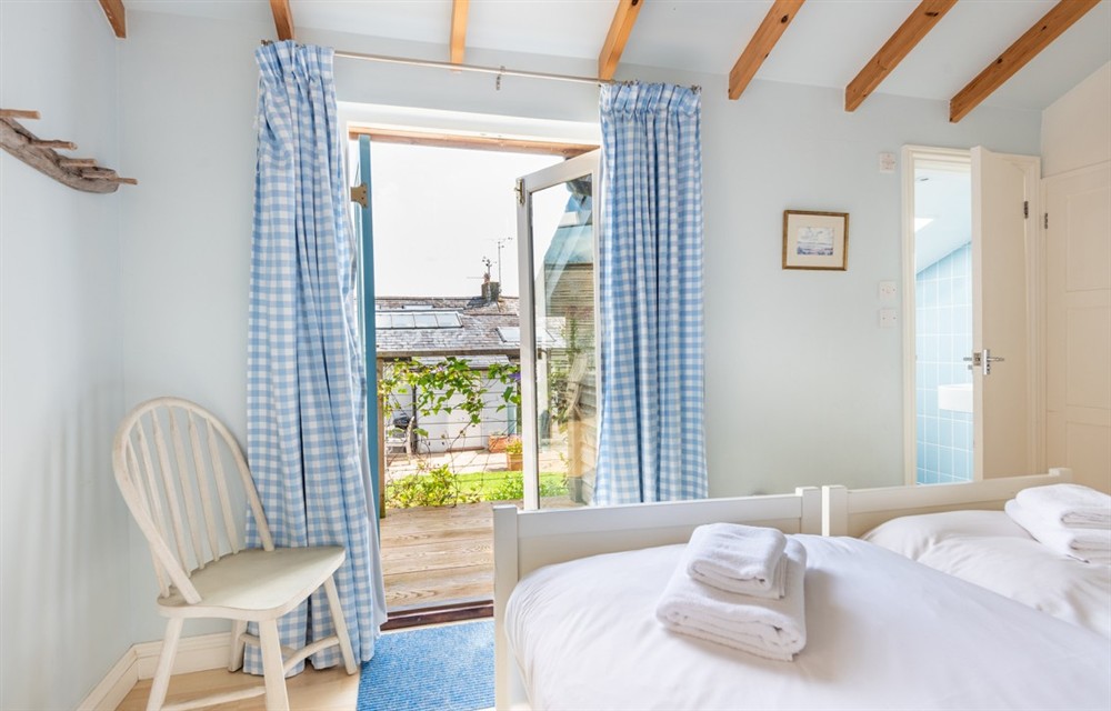 This is a bedroom (photo 2) at Dunedin Cottage in Dittisham