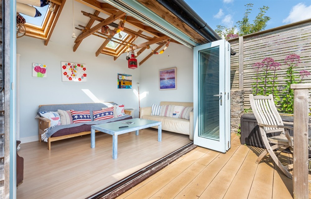 This is the living room (photo 2) at Dunedin Cottage in Dittisham