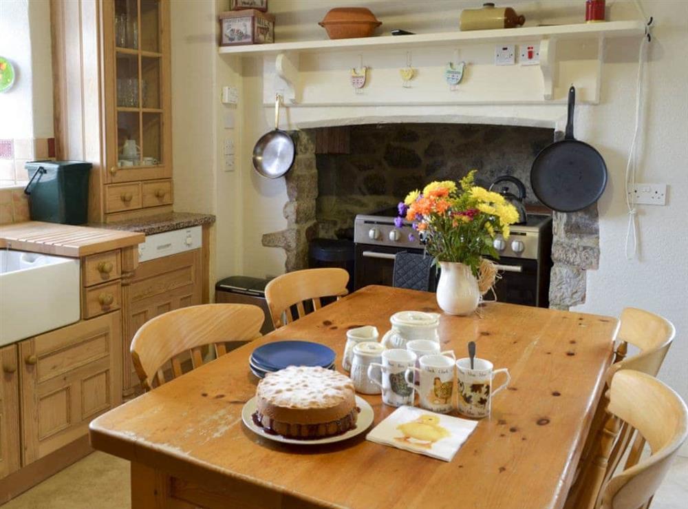 Traditional kitchen with breakfast area (photo 2) at Dunley Farmhouse in Bovey Tracey, near Newton Abbot, Devon