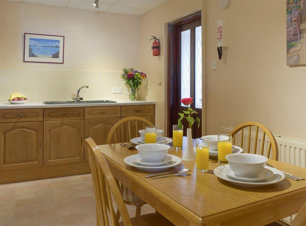 Convenient dining area within kitchen at Dunns Meadow in Llanrhidian, near Swansea, West Glamorgan