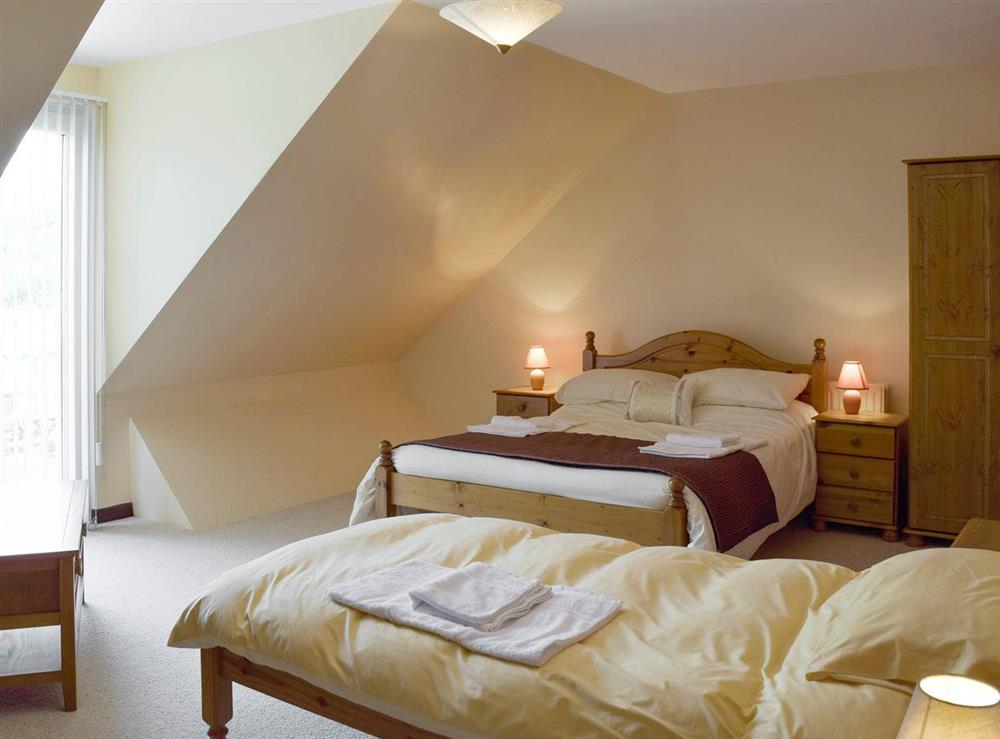 Restful triple sleep bedroom at Dunns Meadow in Llanrhidian, near Swansea, West Glamorgan