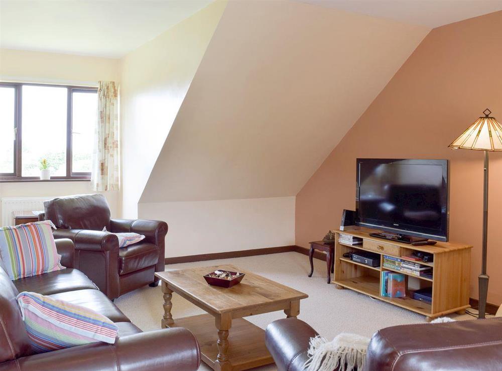 Welcoming first floor living room at Dunns Meadow in Llanrhidian, near Swansea, West Glamorgan