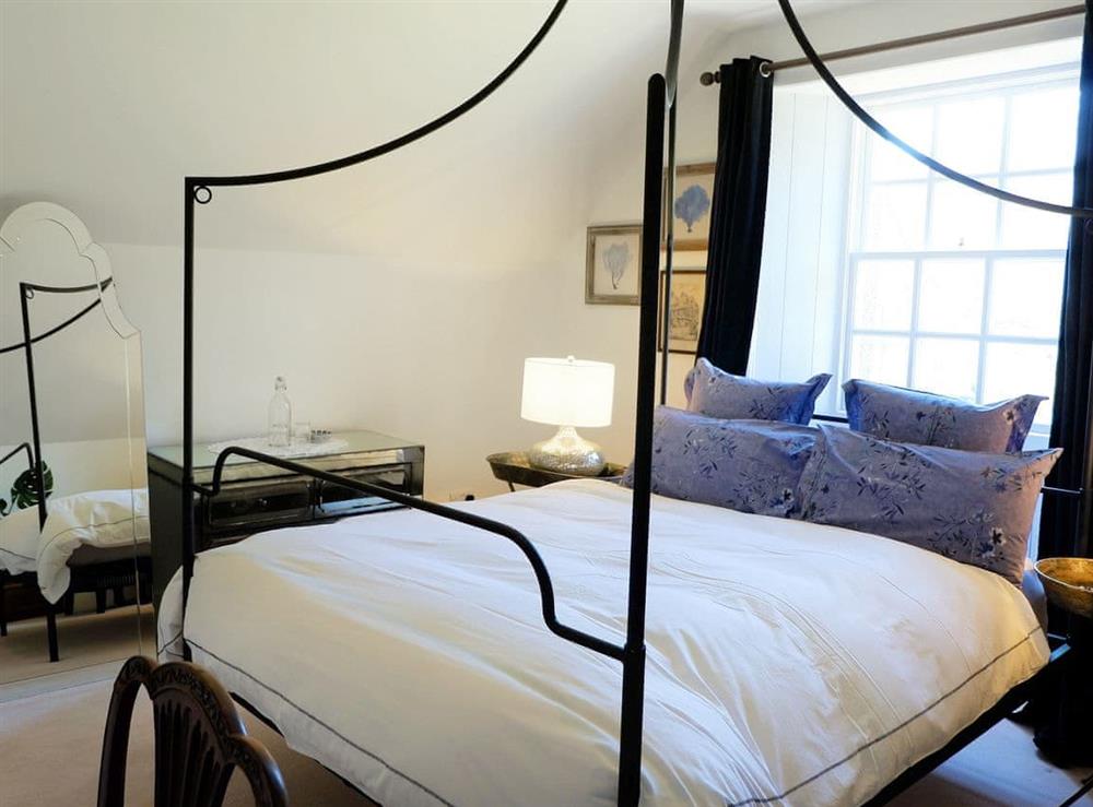 Four Poster bedroom at Dunskey Estate Apartment, 