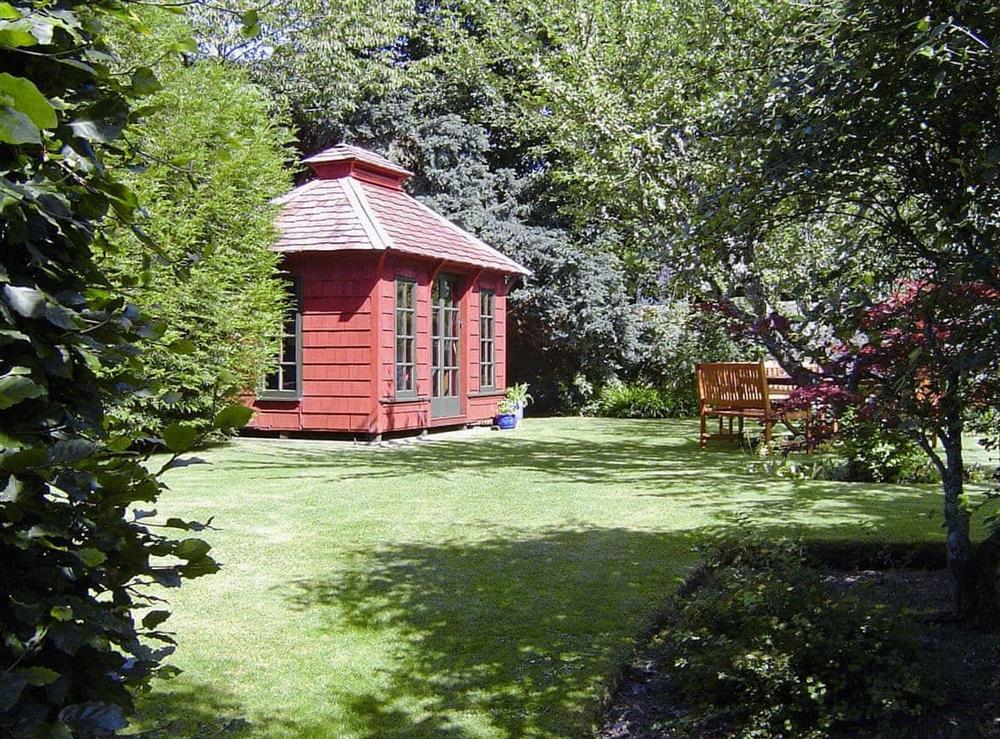 Large enclosed garden, patio and furniture at Dunvarlich House in Aberfeldy, Perthshire., Great Britain