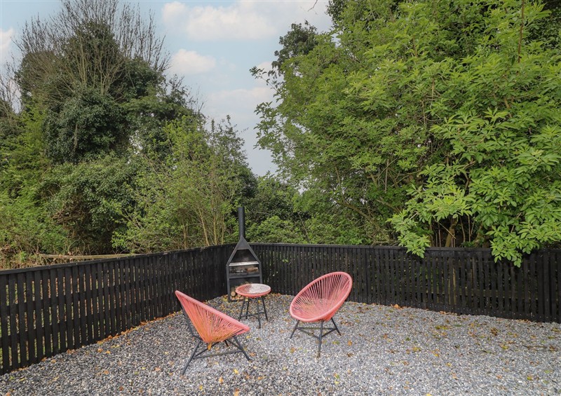 Enjoy the garden (photo 2) at Dunville Lodge, Rhode