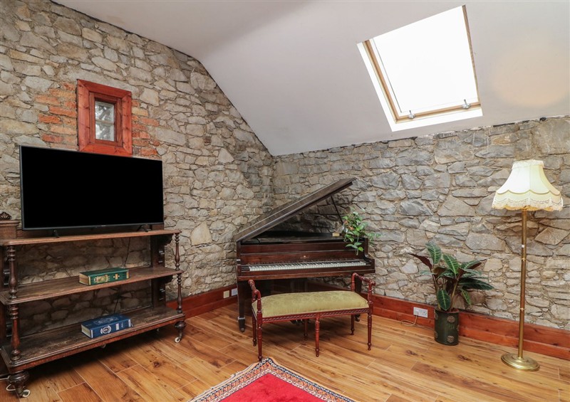 Relax in the living area (photo 2) at Dunville Lodge, Rhode