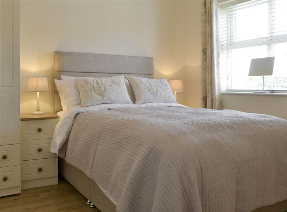 Typical comfortable double bedroom at Bramble Cottage, 