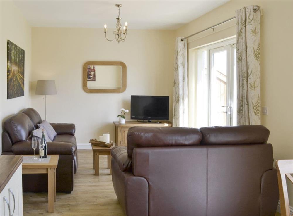Typical stylish living area at Bramble Cottage, 