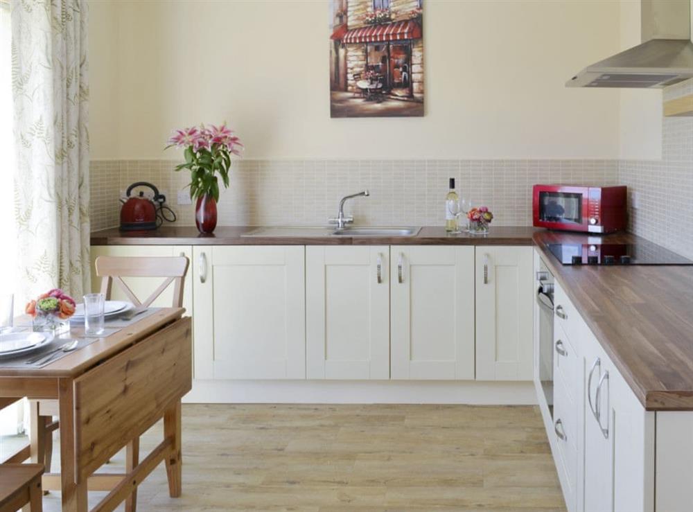 Typical convenient dining area within kitchen at Kestrel Cottage, 