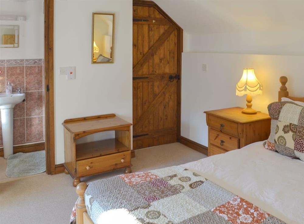 Comfortable double bedroom with en-suite at Duvale Barn, 