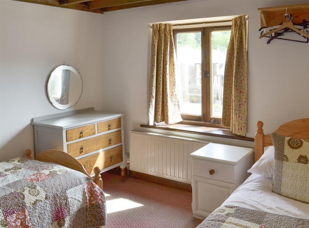 Light and airy twin bedroom (photo 2) at Duvale Barn, 