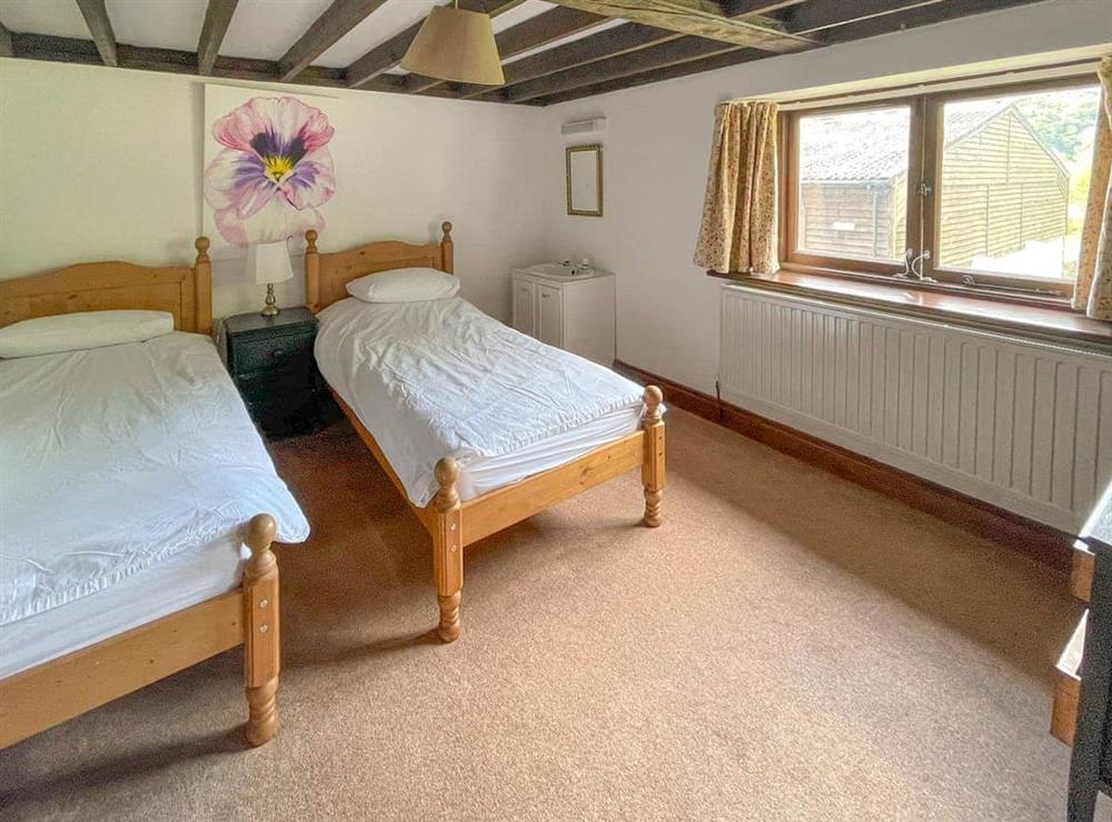 Light and airy twin bedroom at Duvale Barn, 