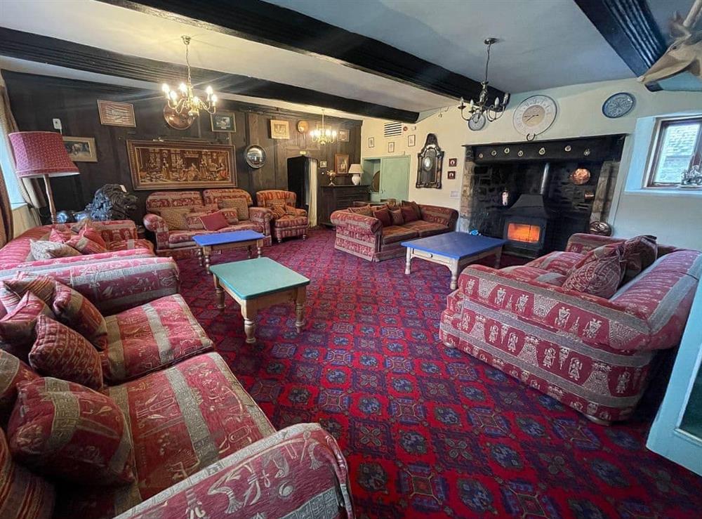 Characterful living room at Duvale Priory in Bampton, near Tiverton, Devon