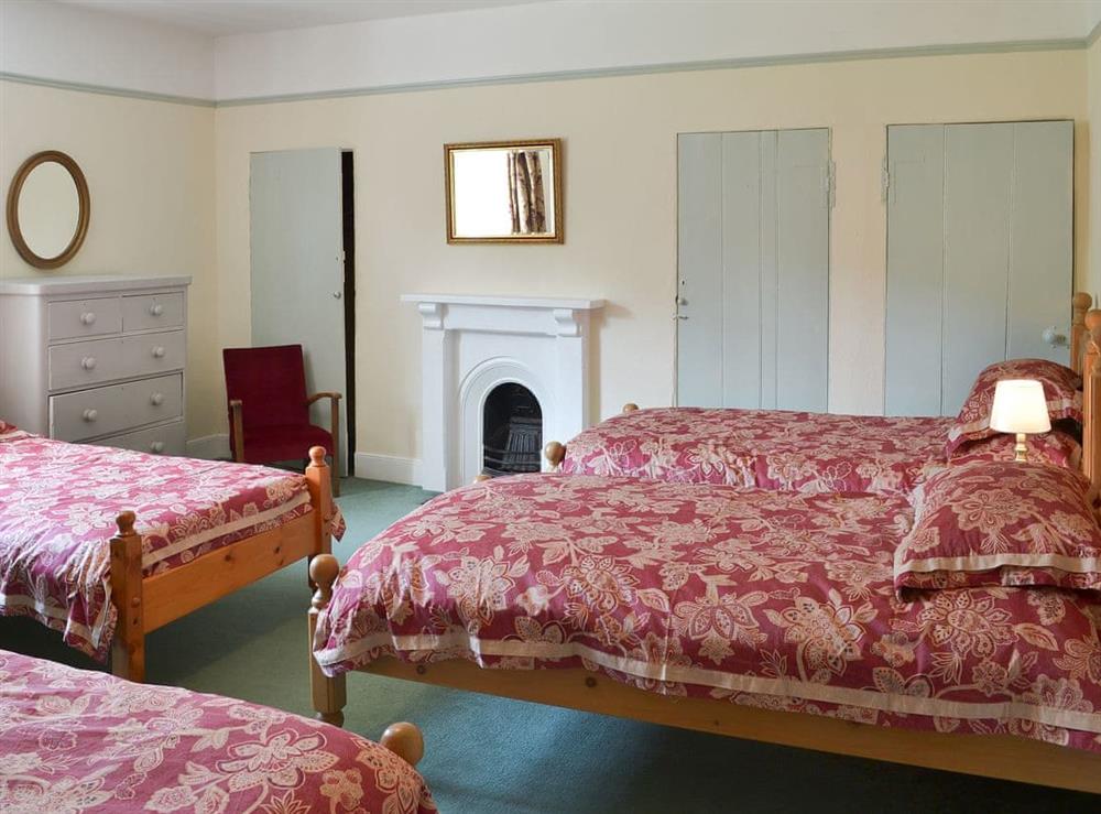 Multi-sleep bedroom with en-suite (photo 2) at Duvale Priory in Bampton, near Tiverton, Devon