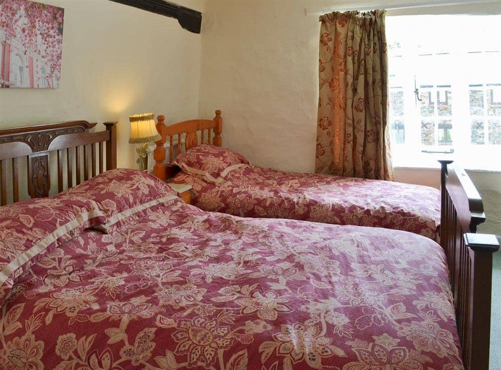 Triple bedroom with a double and a single bed at Duvale Priory in Bampton, near Tiverton, Devon