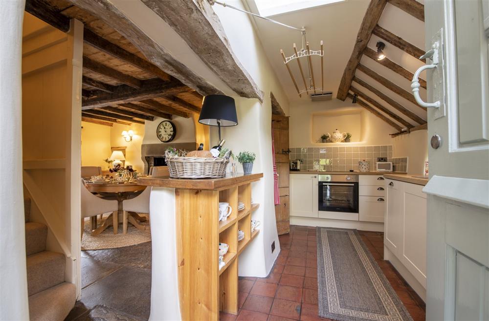 Cottage style kitchen leading through to the dining room at Duxey Cottage, Nr Masham, Ripon