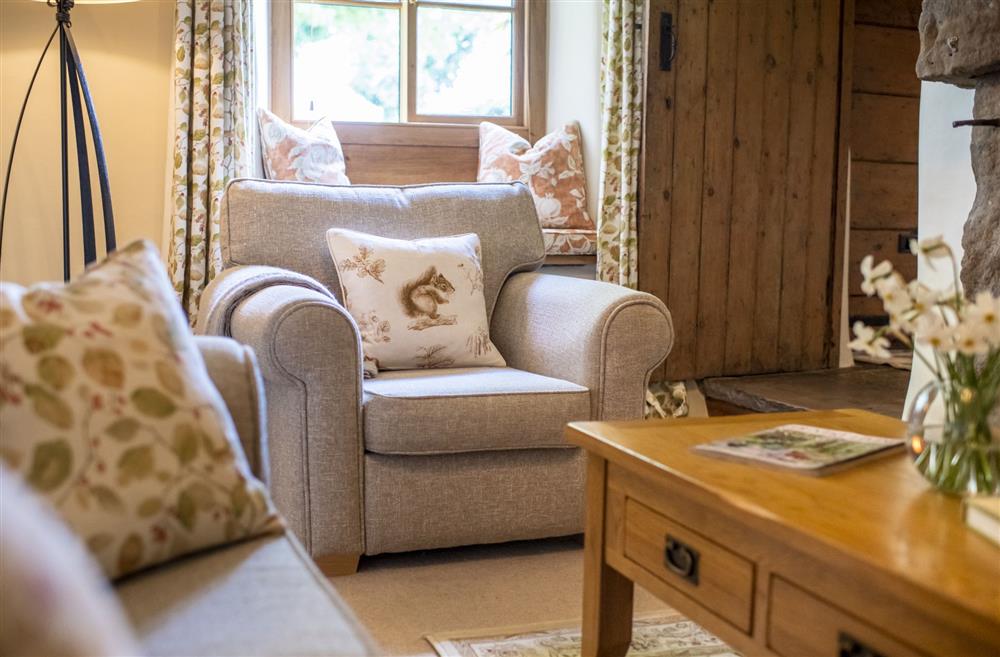 Sitting room with plush seating at Duxey Cottage, Nr Masham, Ripon