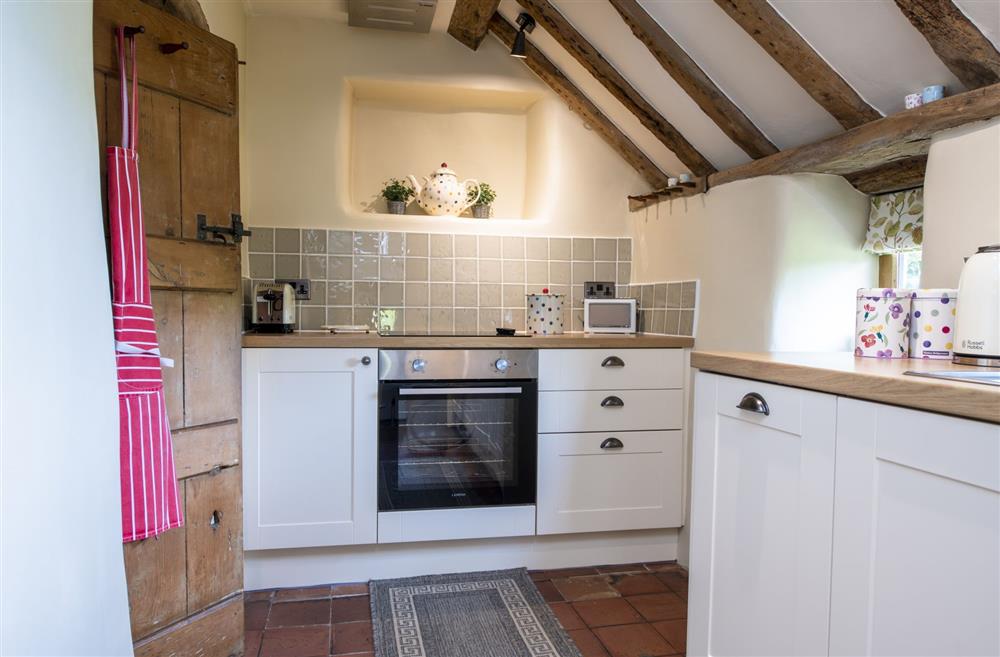 Well-equipped cottage kitchen nestled amongst the eaves at Duxey Cottage, Nr Masham, Ripon