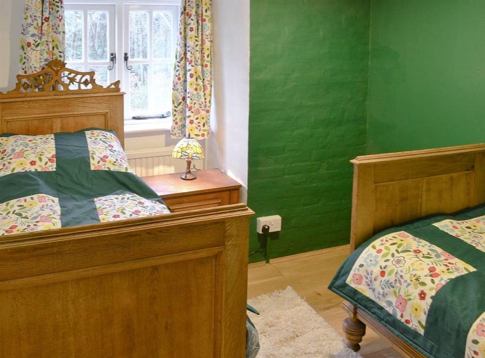 Twin bedroom at Dyes Cottage in Hindolveston, near Holt, Norfolk
