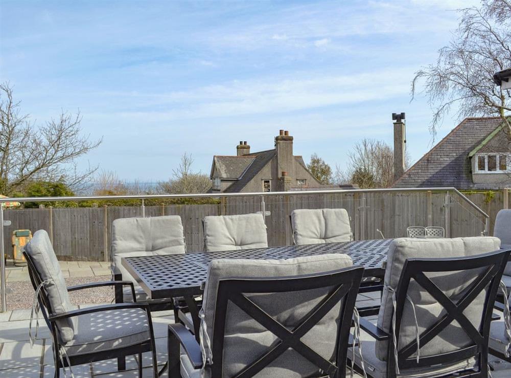 Ideal sitting out area (photo 2) at Dylmor in Benllech , North Wales, Gwynedd