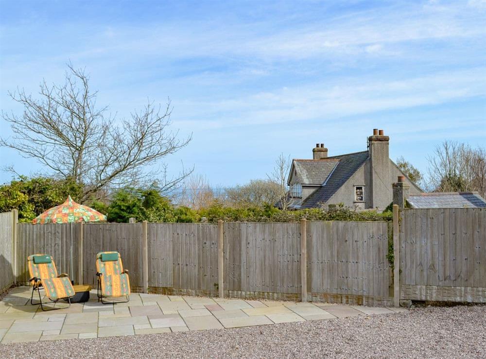 Spacious grounds with sitting out area at Dylmor in Benllech , North Wales, Gwynedd