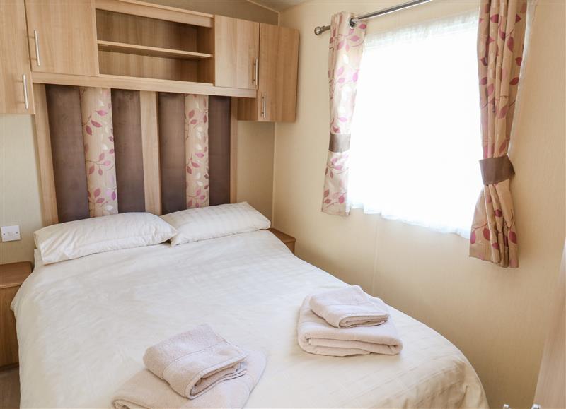 This is a bedroom at E10 Eagle Meadows, Hoburne Devon Bay Holiday Park near Paignton