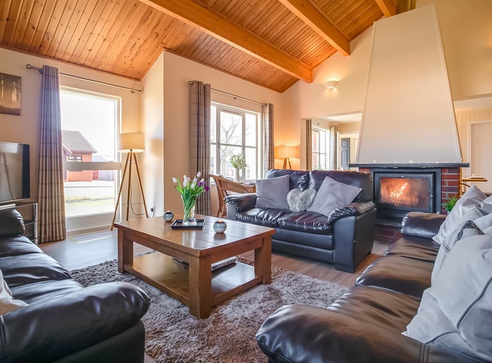 Living area at Eagle 3 Star in Aviemore, Inverness-Shire
