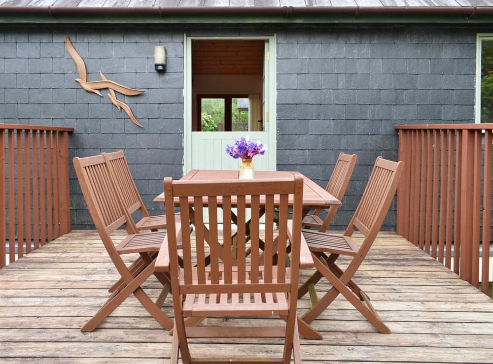 Decked area with outdoor furniture at Eagles Nest in St Mellion, near Saltash, Cornwall
