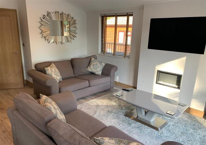 Relax in the living area at Easedale Lodge, Windermere