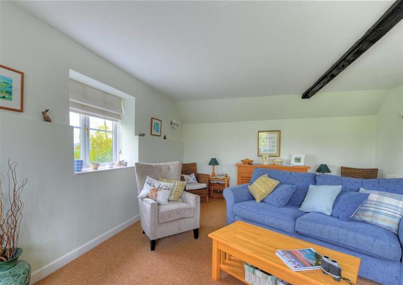 Relax in the living area at East Barn, Charmouth