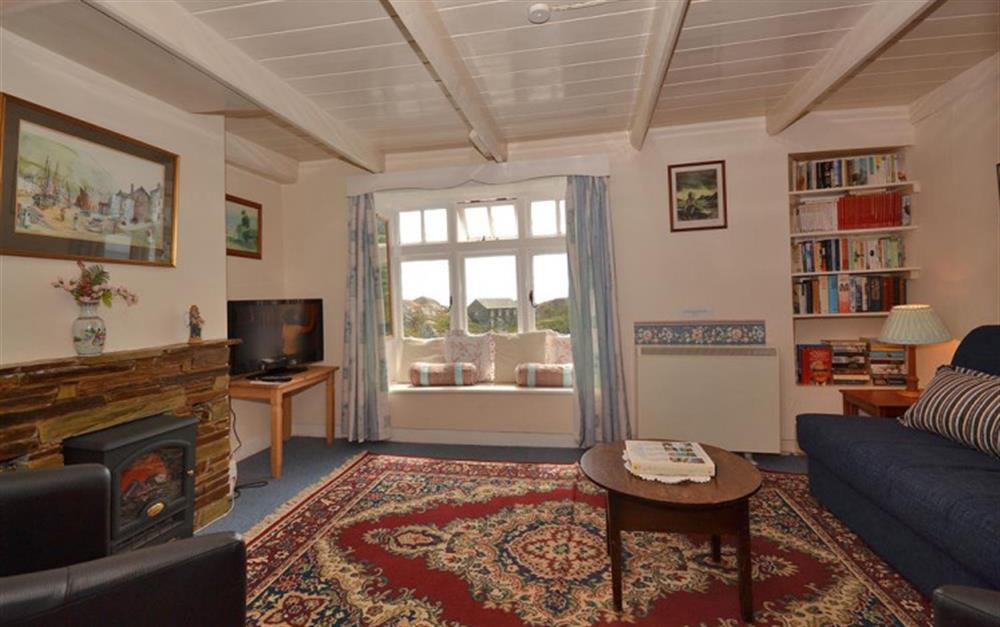 The cosy living room at East Cliff in Polperro