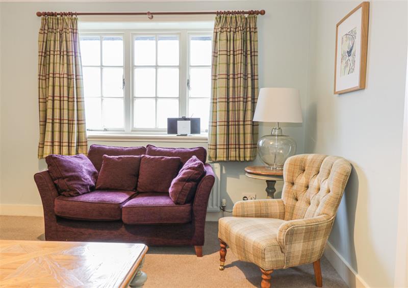 Enjoy the living room at East Cottage, Cupar
