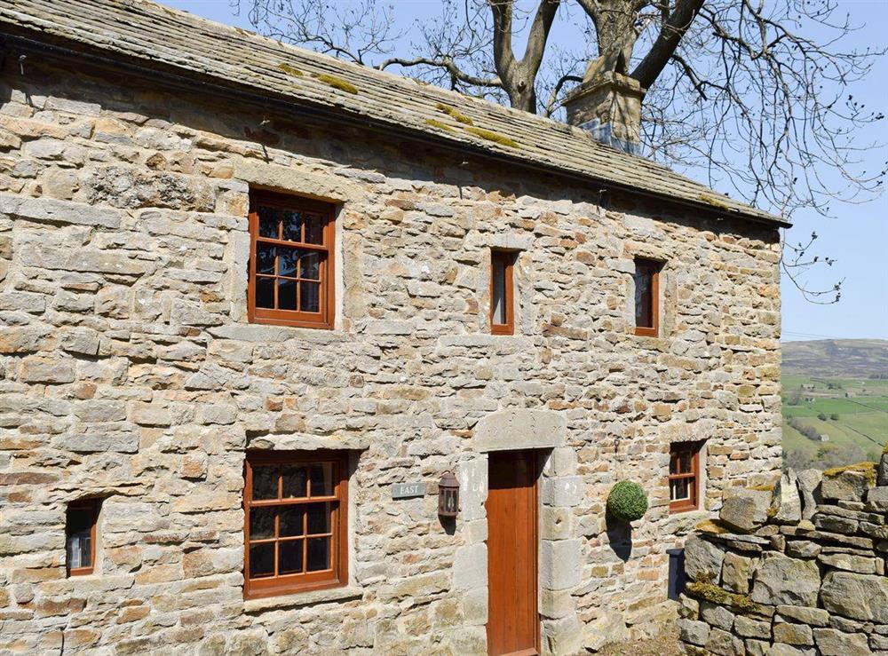 Traditional Yorkshire stone country cottage at East Cottage in Low Row near Reeth, North Yorkshire