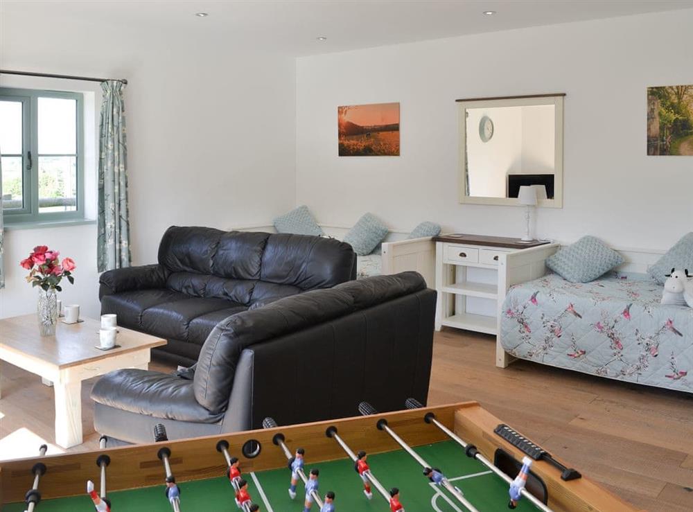 Sitting room with table football (photo 3) at East Croft Barn in Halwill, near Holsworthy, Devon
