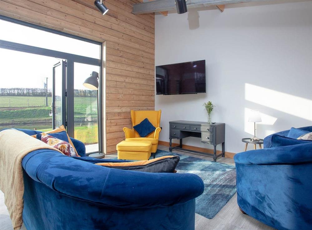 Living area (photo 2) at East Dunster Deer Farm – Kingfisher Lodge in Cadeleigh, Devon