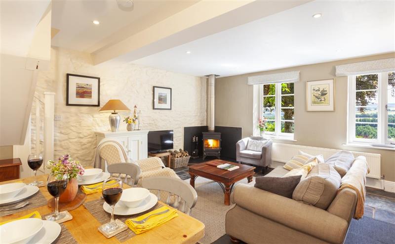 Enjoy the living room at East Harwood Farm Cottage, Timberscombe
