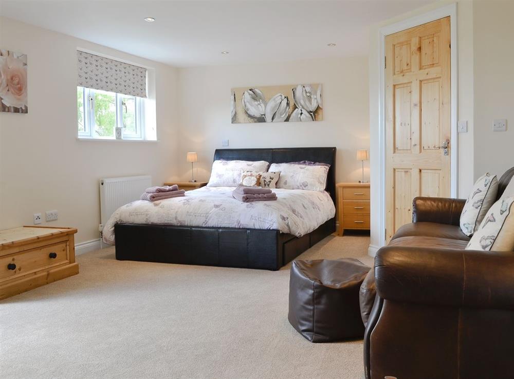 Master bedroom at East Hillerton Lodge in Spreyton, near Okehampton, Devon