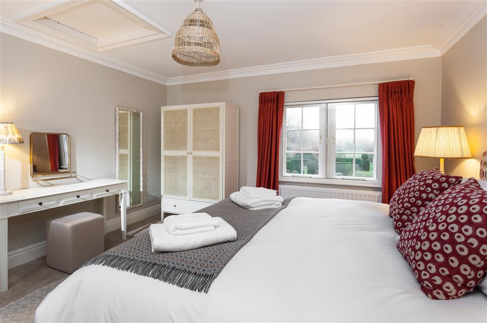 Bedroom three with a 6’ super-king size bed (photo 2) at East House, Arley