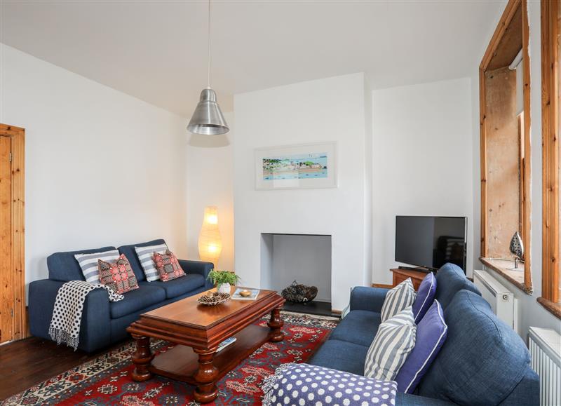 Relax in the living area at East Lighthouse Keepers Cottage, Llaneilian near Amlwch