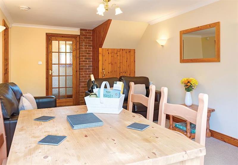 Dining room at Horseshoe Cottage at Eastdon Estate in Dawlish, Devon