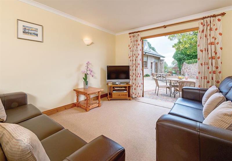 Living room at Primrose Cottage at Eastdon Estate in Dawlish, Devon