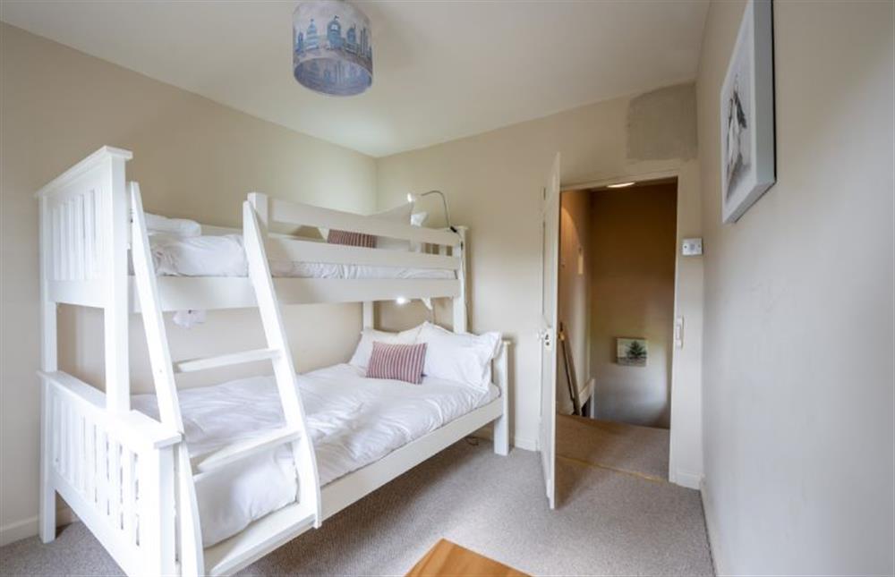 First floor: Bunk bedroom with double below and single above at Eastgate Cottage and Hideaway, Salthouse near Holt