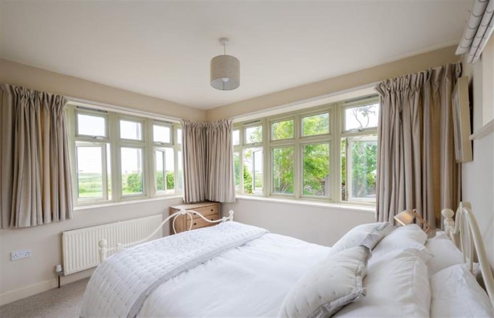 Ground floor: King-size bedroom with lovely views at Eastgate Cottage and Hideaway, Salthouse near Holt